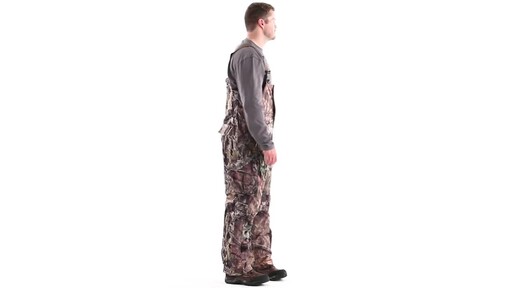 Guide Gear Men's Steadfast Waterproof Hunting Bibs 150 Gram Thinsulate Platinum with X-Static 360 View - image 3 from the video