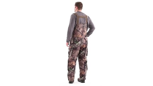 Guide Gear Men's Steadfast Waterproof Hunting Bibs 150 Gram Thinsulate Platinum with X-Static 360 View - image 6 from the video