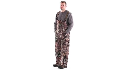 Guide Gear Men's Steadfast Waterproof Hunting Bibs 150 Gram Thinsulate Platinum with X-Static 360 View - image 8 from the video