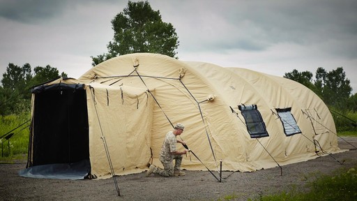 US Military Issue AirBeam Shelter 32' x 20' New - image 1 from the video