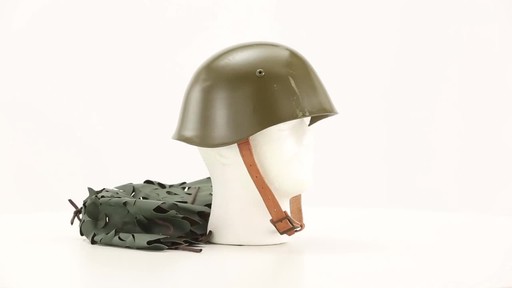 Bulgarian Military Surplus M72 Steel Pot Helmet with Cover Used - image 7 from the video