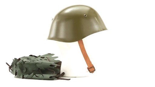 Bulgarian Military Surplus M72 Steel Pot Helmet with Cover Used - image 2 from the video