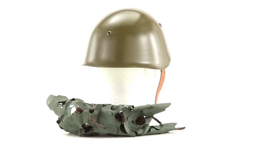 Bulgarian Military Surplus M72 Steel Pot Helmet with Cover Used - image 3 from the video