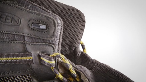KEEN Men's Voyageur Mid Hiking Boots - image 7 from the video