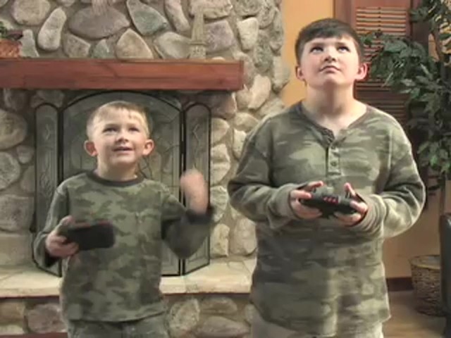 Dueling Remote - controlled Helicopters  - image 4 from the video