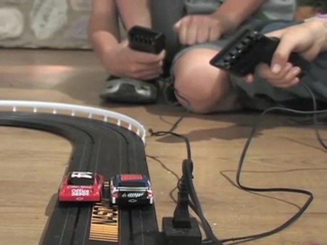 NASCAR&reg; High - speed Rivals Slot Car Set - image 2 from the video