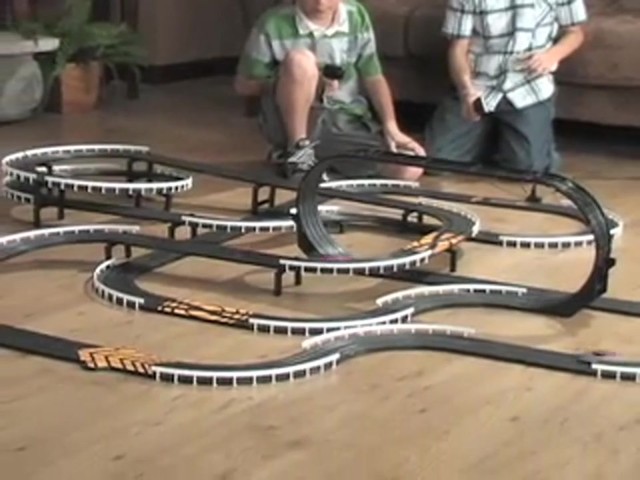 NASCAR&reg; High - speed Rivals Slot Car Set - image 3 from the video