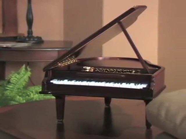 Gold Label&reg; Piano Concertina Holiday Music Box - image 10 from the video