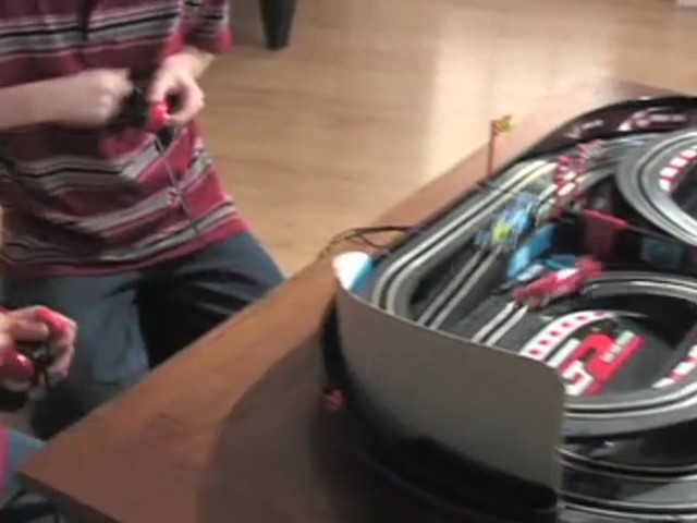 Venom&reg; Portable Crank Slot Car Set - image 2 from the video