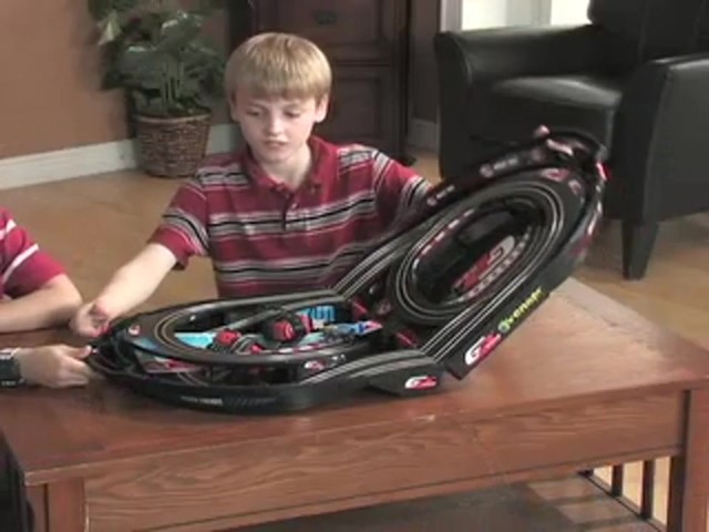 Venom&reg; Portable Crank Slot Car Set - image 7 from the video