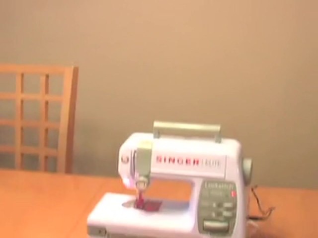 Singer&reg; Deluxe Elite Lockstitch Sewing Center - image 10 from the video
