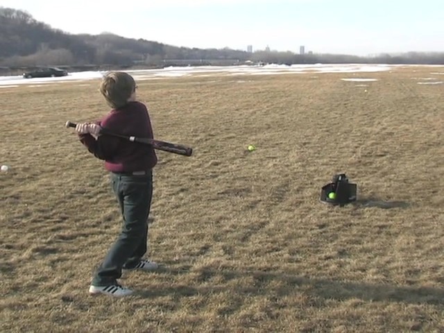 Axiom® Toss Master Soft Toss Pitching Machine - image 4 from the video