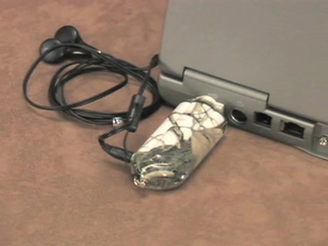 Nextar&reg; 1GB MP3 Player Camo - image 5 from the video