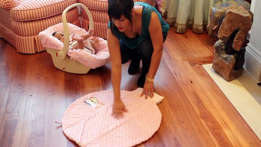 Itzy Ritzy Wrap & Roll Infant Carrier Pad and Mat - image 3 from the video