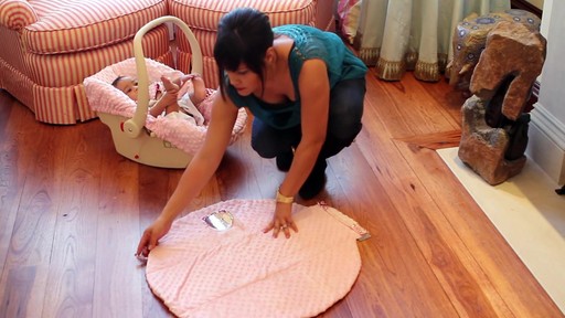 Itzy Ritzy Wrap & Roll Infant Carrier Pad and Mat - image 4 from the video