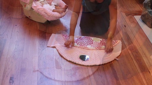 Itzy Ritzy Wrap & Roll Infant Carrier Pad and Mat - image 7 from the video