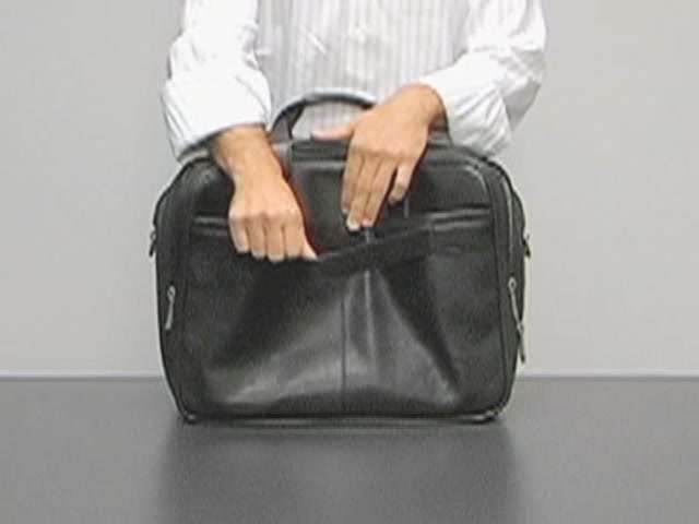 eBags Deluxe Full-Grain Leather Laptop Brief - image 8 from the video