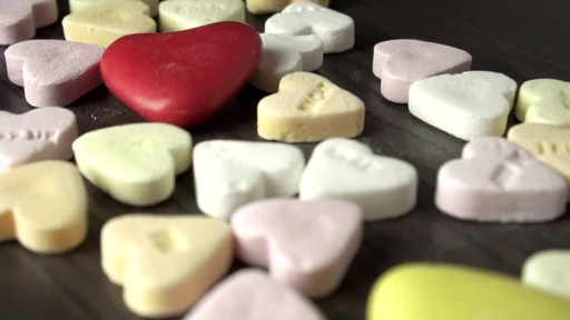 coverr-heart-candies-on-a-table-1581349419143.mp4 - image 1 from the video