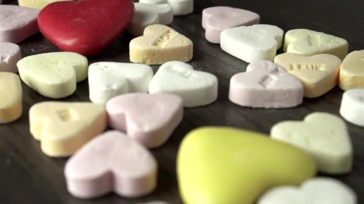 coverr-heart-candies-on-a-table-1581349419143.mp4 - image 2 from the video